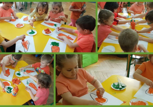 Dzieci stemplują marchewką.