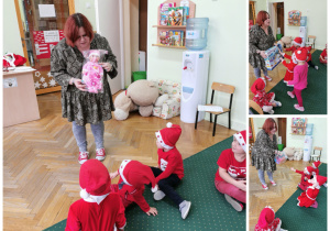 Pani Dyrektor wręcza dzieciom prezenty, które zostawił w przedszkolu Święty Mikołaj.